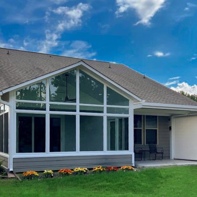 Cathredral Sunroom with fixed Pergola and Motorized Retractable Screens built to last and withstand Midwest winters