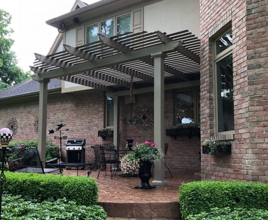 Attached pergola is maintenance free and built to withstand the Midwest weather