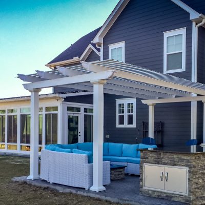 Enjoy this combo space year round with a stunning pergola and glass enclosed sunroom