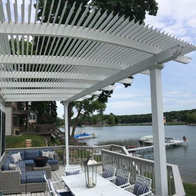 Website pergola overlooking lake PRG Class Fx Attch Flor Wt Outsd Day 0001 Opn