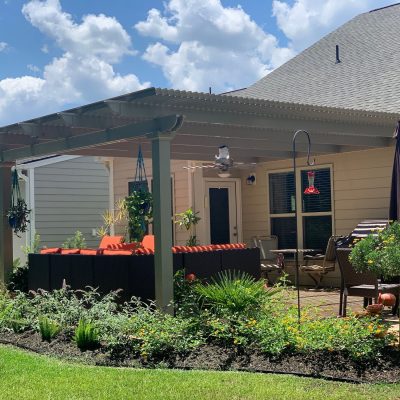 Enjoy a stunning motorized pergola that opens and closes with the push of a button